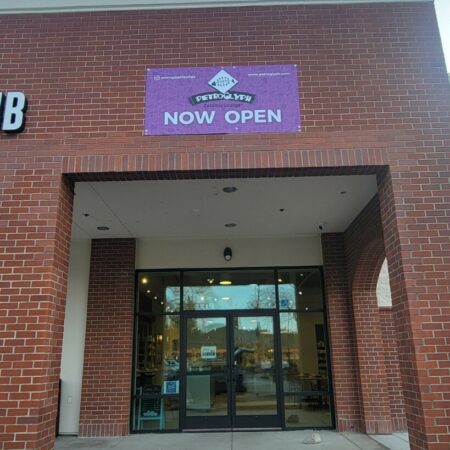 The storefront of the Petroglyph Sacramento Studio.