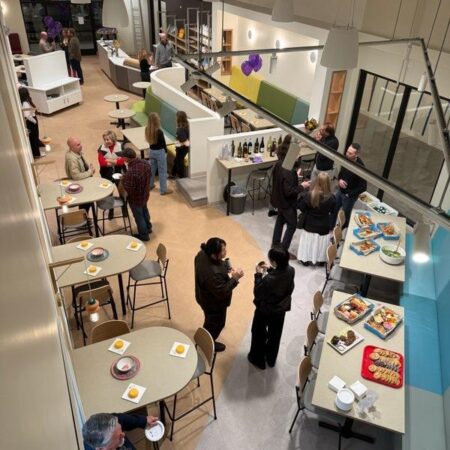 View of people enjoying a fun activity in Sacramento Petroglyph studio.
