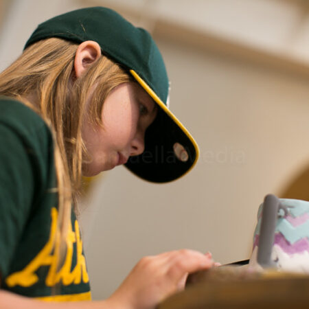 Children enjoying ceramic painting at Petroglyph’s Santa Cruz Studio.
